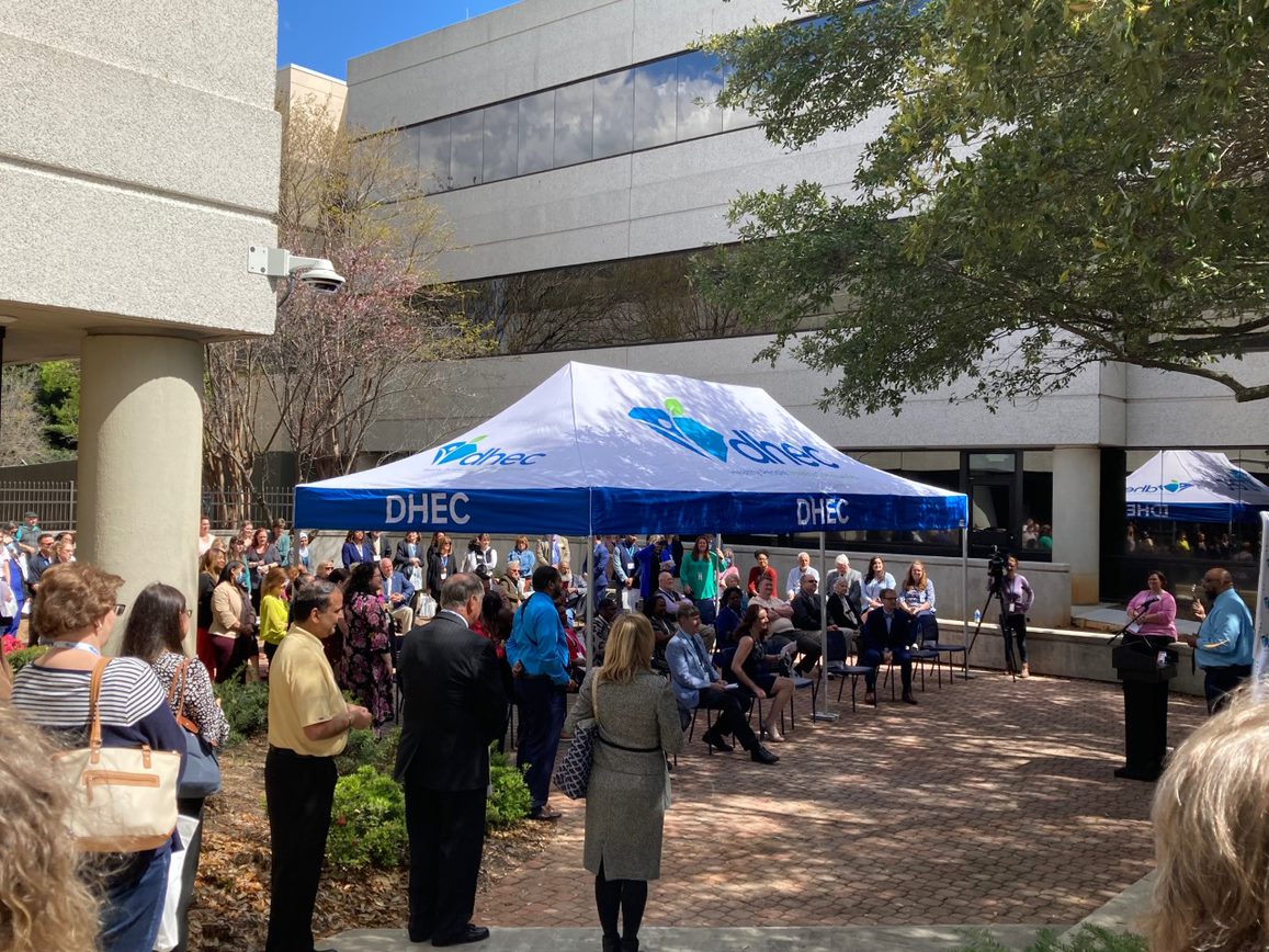 People gathered outside the Greenville public health department for it's grand opening